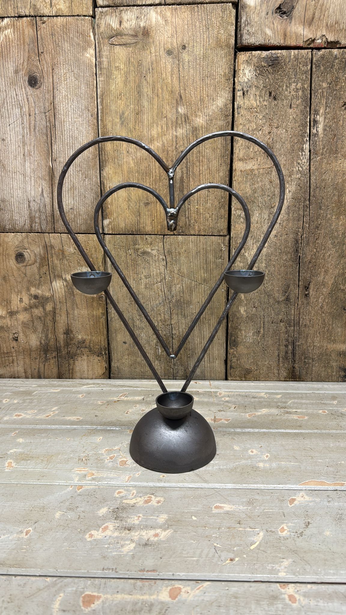 Steel candle holder